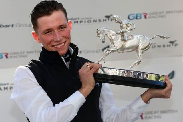 Jockey Jason Watson pictured with The Champion Apprentice Jockey trophy at Ascot last month. PIC: Julian Herbert/PA Wire