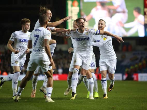 WINNING FEELING: Liam Cooper celebrates his scorching strike against Ipswich Town with his Leeds United team-mates.