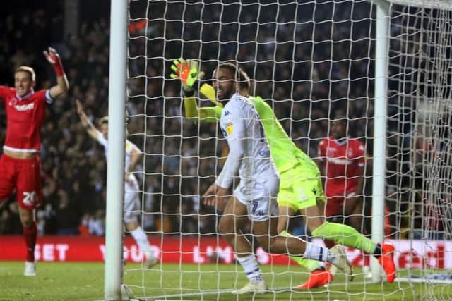 Kemar Roofe celebrates Leeds United's controversial leveller against Nottingham Forest.