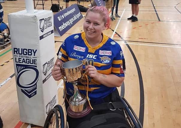 Jodie Boyd-Ward with the Grand Final trophy. Picture: Leeds Rhinos wheelchair rugby league club.