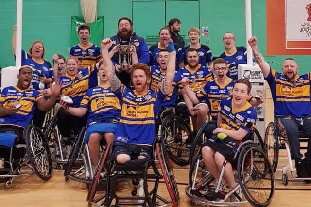 Leeds Rhinos wheelchair rugby league team celebrate their Grand Final victory over Halifax.