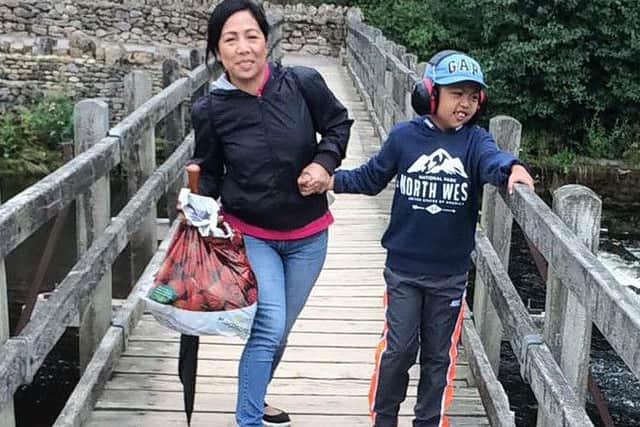 Fundraising: Jacob Ocampo, 10, and mum Jennifer.