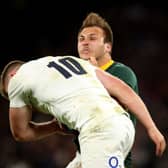 England's Owen Farrell tackles South Africa's Andre Esterhuizen at Twickenham. Picture: Adam Davy/PA