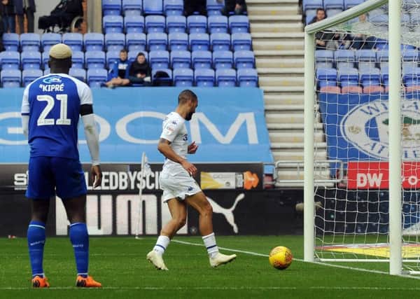 Kemar Roofe walks the ball into the net for the winning goal for Leeds United at Wigan. Picture: Simon Hulme