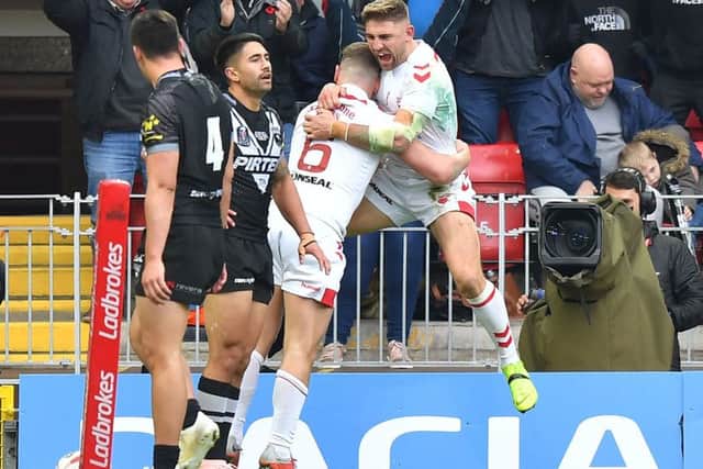 Tommy Makinson celebrates scoring his and Englands first try before going on to complete a hat-trick as they beat New Zealand at Anfield (Picture: Dave Howarth/PA Wire).