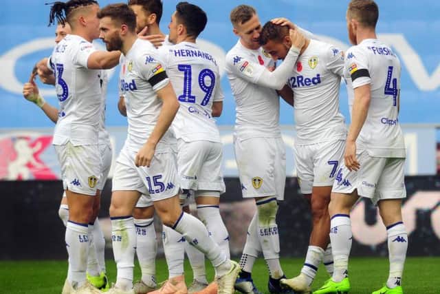 Leeds United's players celebrate at the DW stadium.