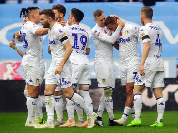 Leeds United's players celebrate at the DW stadium.