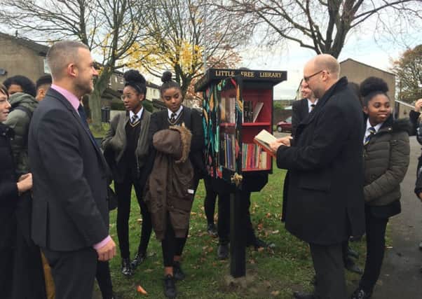CELEBRATION: Locals welcome the new Little Library.