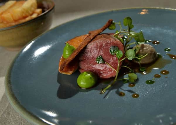 Aged fillet of beef, king oyster, parsley emulsion, chunky chips.
 PIC: Bruce Rollinson