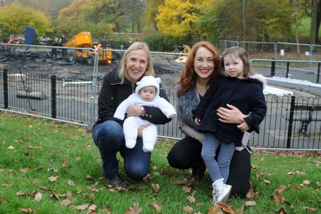 Julia Wilson with Sara Dawson and her children Elodie and Isadora by the childrens playground in Roundhay Park, Leeds where work has started to replace the play equipment.  Picture Tony Johnson.