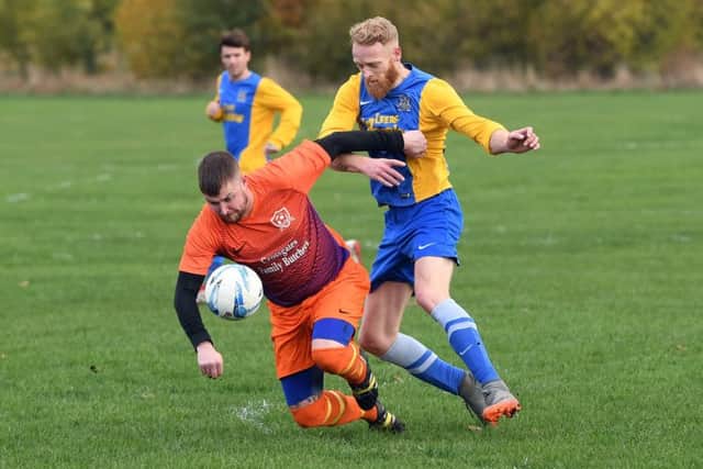 Hope Inn's Scott Jones loses out to Bramley's Daniel Jacklyn. PIC: Jonathan Gawthorpe