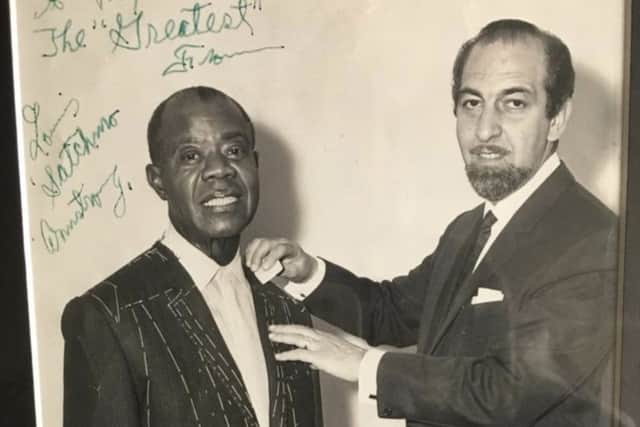Louis Armstrong and Max Freeman.