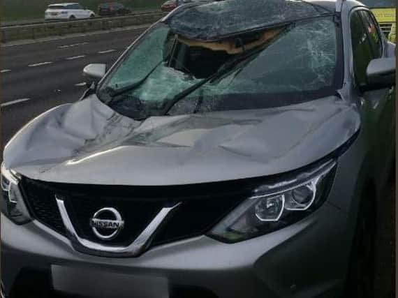 A tyre from a caravan travelling in the opposite direction hit the car on the M62 (PIC: WYP Traffic Police)