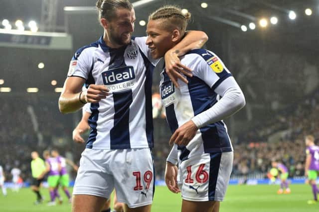 West Brom striker Dwight Gayle celebrates a goal against Bristol City. Gayle is hoping to return from a calf strain this weekend.