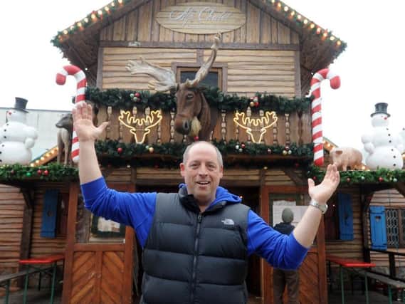 Market trader Daniel Loewenthal with the iconic moose head at the Leeds Christmas Market which opened Friday November 9.