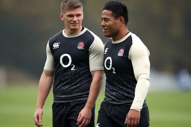 England's Owen Farrell (left) and Manu Tuilagi during the training session at Pennyhill Park. Picture: Adam Davy/PA