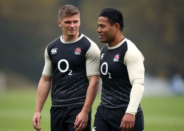 England's Owen Farrell (left) and Manu Tuilagi during the training session at Pennyhill Park. Picture: Adam Davy/PA