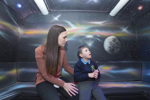 First BusThe bus donated by First West Yorkshire to Broomfield South School in Leeds, West Yorkshire, and which has then been fitted out by different partners.Staff member Naomi Lyons with pupil Henry in the space themed sensory room on board the bus.Photograph by Richard Walker - www.imagenorth.net