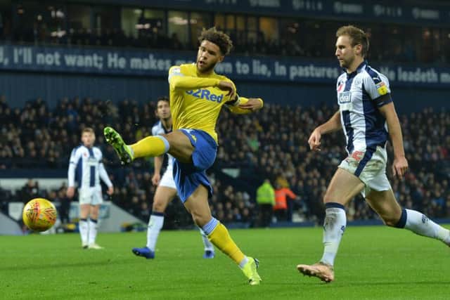 Tyler Roberts fires off a shot at West Brom.