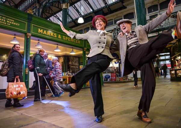 M&S ARCHIVE 1940s Swing Dancers Linda and Roger Briggs from Halifax, celebrate their Ruby (40th) Anniversary with a Swing Dance at Leeds Indoor Market