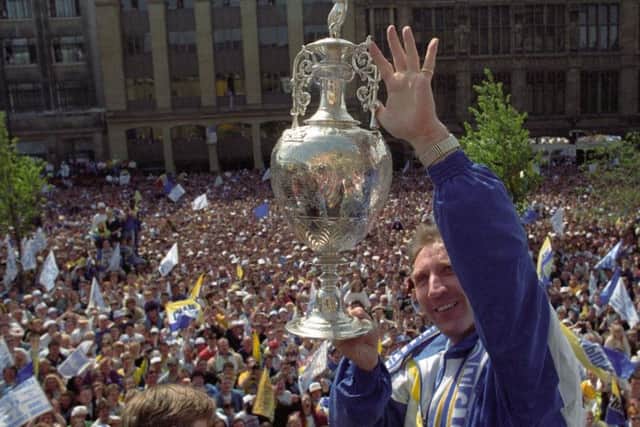 Howard Wilkinson raises the English first division championship trophy in 1992. PIC: Yorkshire Post Newspapers