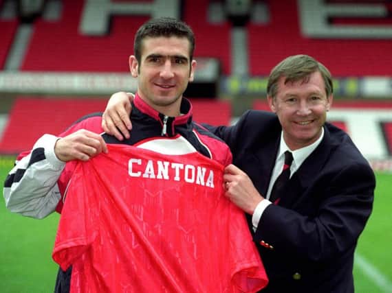 Eric Cantona signs for Manchester United from arch-rivals Leeds United.