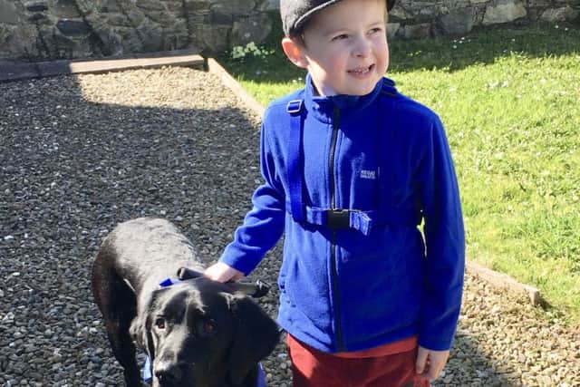 Alex Duthrie and his support dog Chester