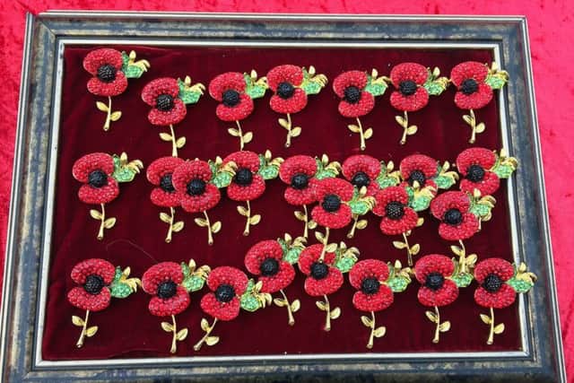 The brooches that were being sold. PIC: PA