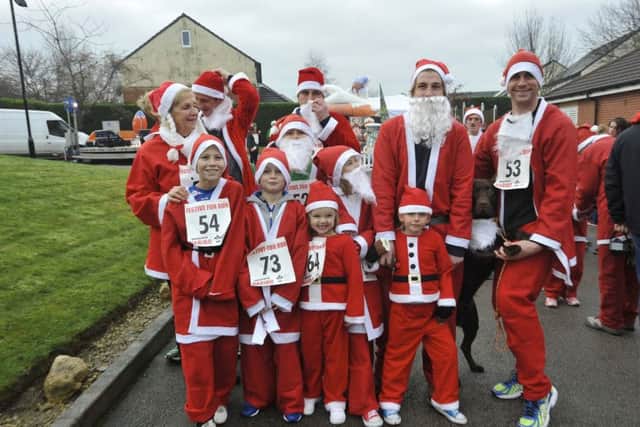 GREAT FUN: Some of the participants in last years hospice Santa dash.