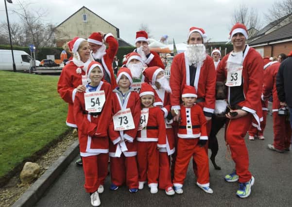 GREAT FUN: Some of the participants in last years hospice Santa dash.