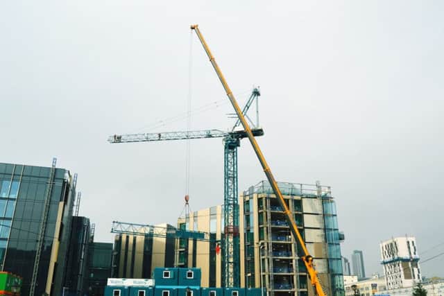 The final crane is removed from the Â£60m Quarry Hill campus. PIC: Adam Cooper/Wates
