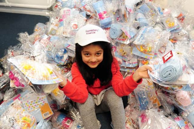 Mission Christmas Appeal at Radio Aire, Leeds..Mahum-Fatima Khan aged 7 pictured with the goody bags.17th November 2018 ..Picture by Simon Hulme