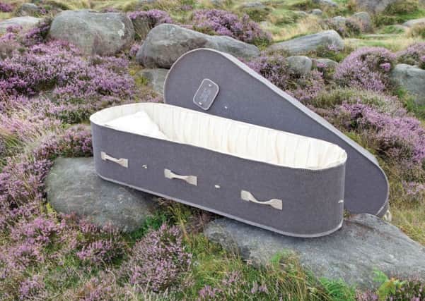 Adult coffin.A prestigious British mill has created the world's first woollen coffins to satisfy an unusual gap in the funeral market. See SWLEcoffins; AW Hainsworth, which clothes royalty at ceremonial events, invented the product because of dissatisfaction at traditional caskets. Conventional coffins are made from wood, which makes them cold, angular and unapproachable to grieving family members, according to AW Hainsworth. Woollen coffins on the other hand, each made from three fleeces and costing Â£900, encourage grievers to approach and connect with their lost loved one. As a 100% biodegradable object their introduction also satiates a growing demand for environmentally friendly coffins. Mourners can either bury the caskets, for them to rot in the ground, or cremate them and keep the ashes.The idea of woollen coffins goes back to the 17th century, when the deceased had to be buried in wool in an attempt to boost the industry. AW Hainsworth, aware of criticisms levelled at traditional coffins, decided to r