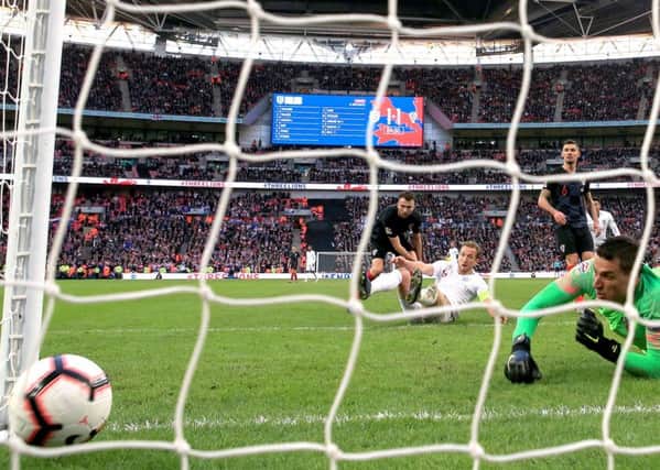 England's Harry Kane (centre) scores his side's winning goal against Croatia at Wembley. Picture: Nick Potts/PA
