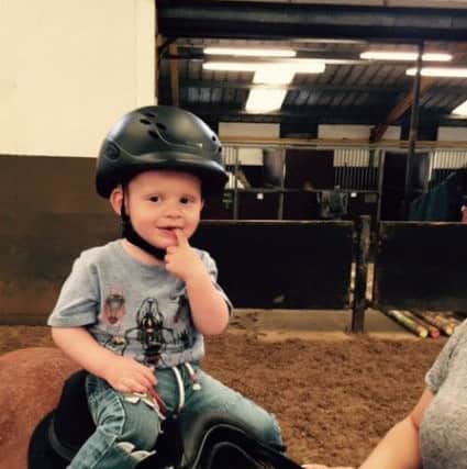 Mum Lisa Waterworth says Middleton Park Equestrian Centre has been central to her son Theo's improvement.