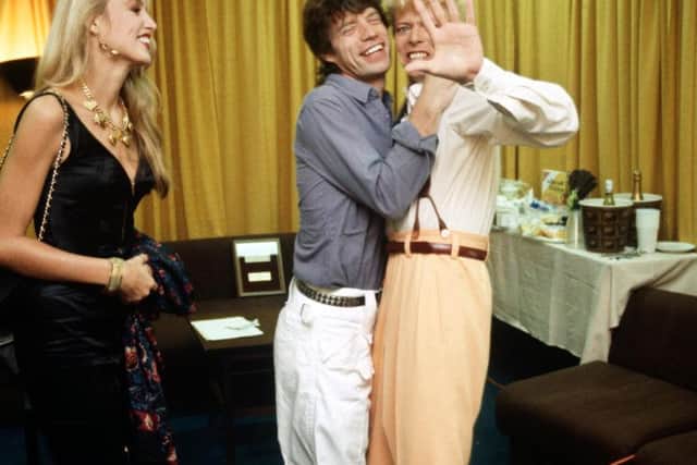 Bowie with Mick Jagger and Jerry Hall in New York. By Denis O'Regan.