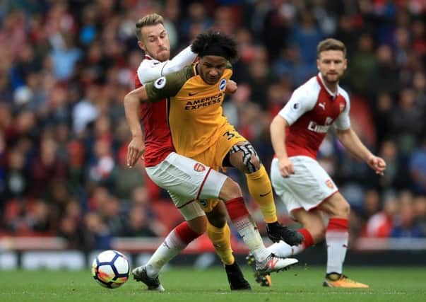 INCOMING: Izzy Brown, centre, pictured in action for Brighton against Arsenal last October.