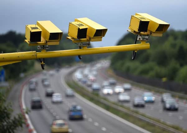 EMBARGOED TO 0900 TUESDAY MAY 31 File photo dated 28/06/15 of three SPECS Average Speed cameras in position on the M3 motorway in Hampshire, as average speed cameras are monitoring drivers on more than 250 miles of Britain's roads, according to a new study.
