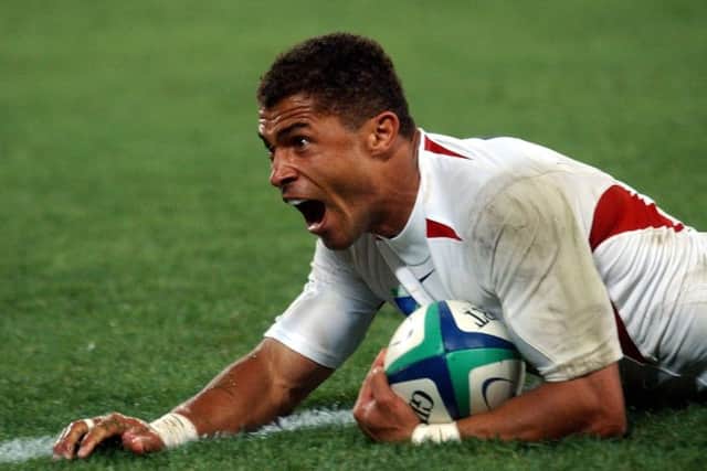 England's Jason Robinson celebrates after scoring in the Rugby World Cup final against Australia in 2003.