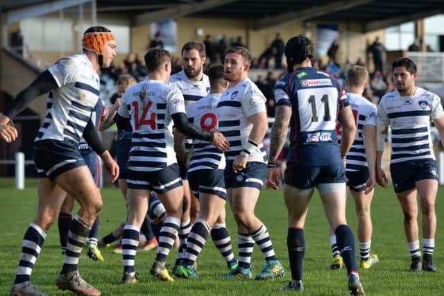 Yorkshire Carnegie players celebrate Chris Elder's try against Doncaster Knights.