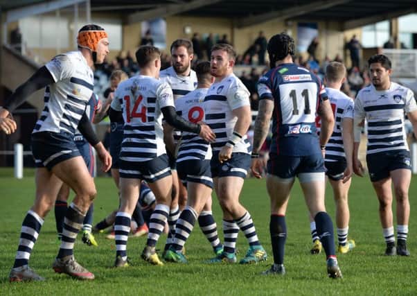 Yorkshire Carnegie players celebrate Chris Elder's try against Doncaster Knights.