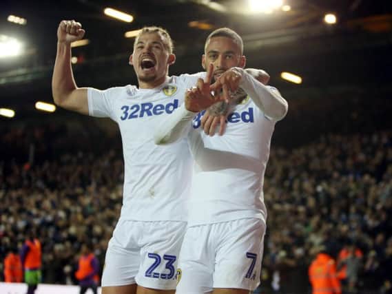 PROLIFIC SPELL: Kemar Roofe celebrates his eighth goal of the season with Kalvin Phillips in Saturday's 2-0 win against Bristol City.