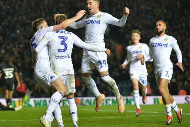 Leeds United players celebrate after scoring against Reading at Elland Road