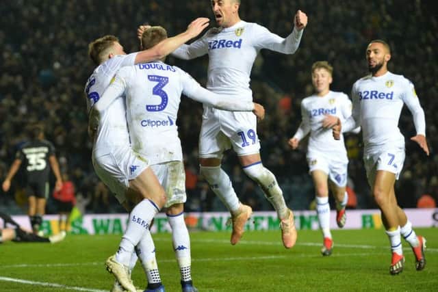 Leeds United's players celebrate after Stuart Dallas' opener against Reading.