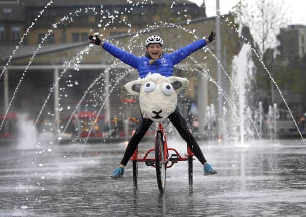 FREE WHEELING: Cyclist Sophie Thackray rides through City Park in Bradford.