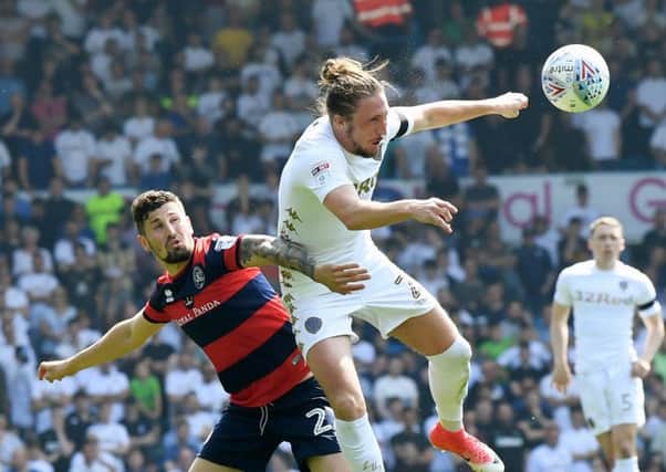 Leeds United v Queen's Park Rangers.
United's Luke Ayling beats QPR's Pawel Wszolek to the header.
Picture Jonathan Gawthorpe
6th May 2018.