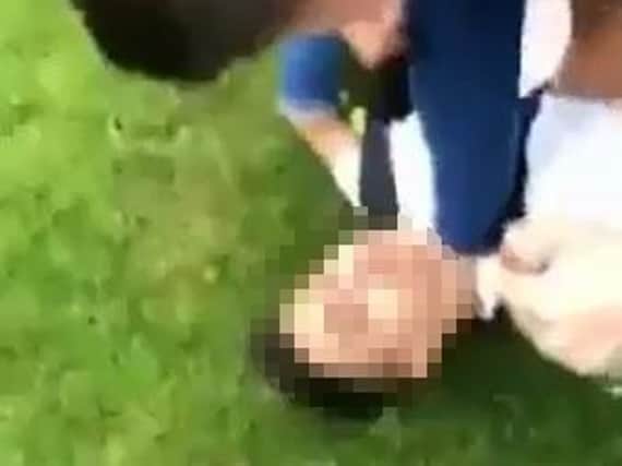 Footage of the attack on the 15-year-old boy went viral earlier this week, prompting calls for police to take action.
