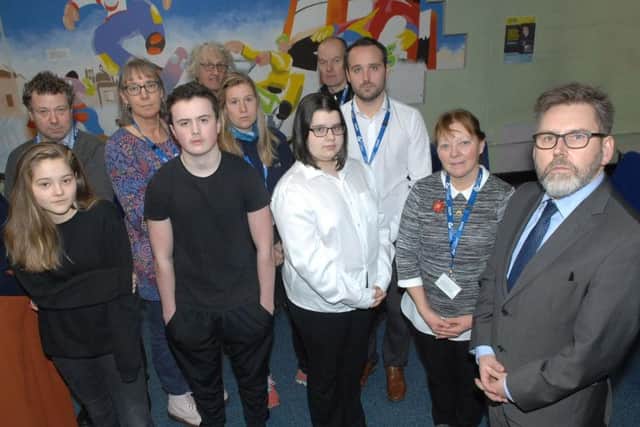 The Grove Academy Principal, John Warren (right) with students and staff members.