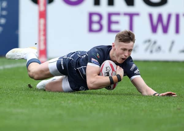 Harry Newman scoring for Featherstone Rovers against Leigh.