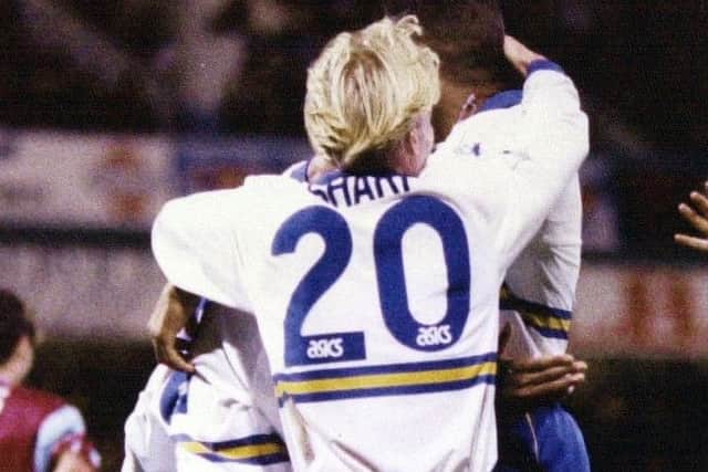 Rod Wallace is congratulated on scoring for Leeds United.